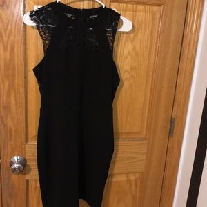 Black express dress. High neck with lace.